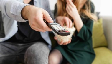 man holding remote control