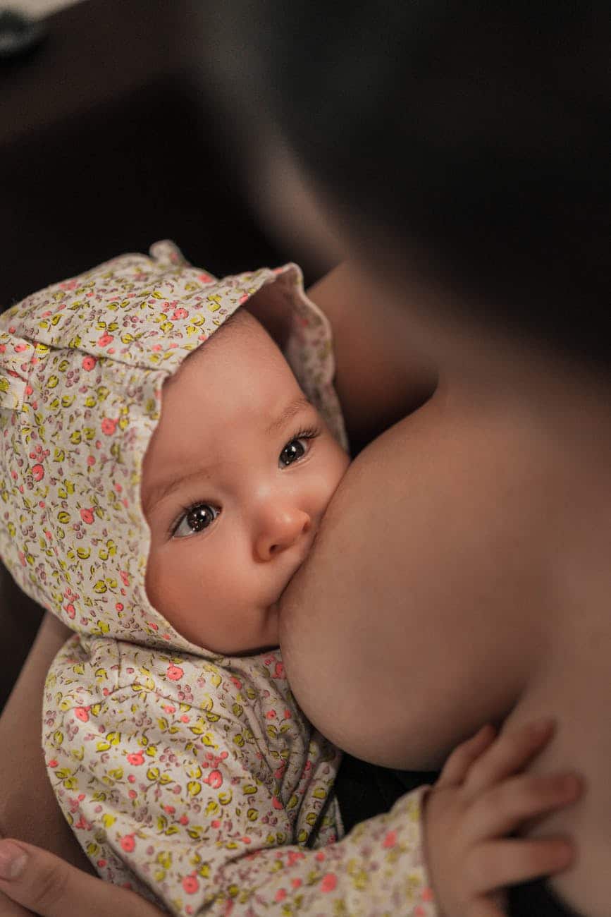 mother breastfeeding her infant