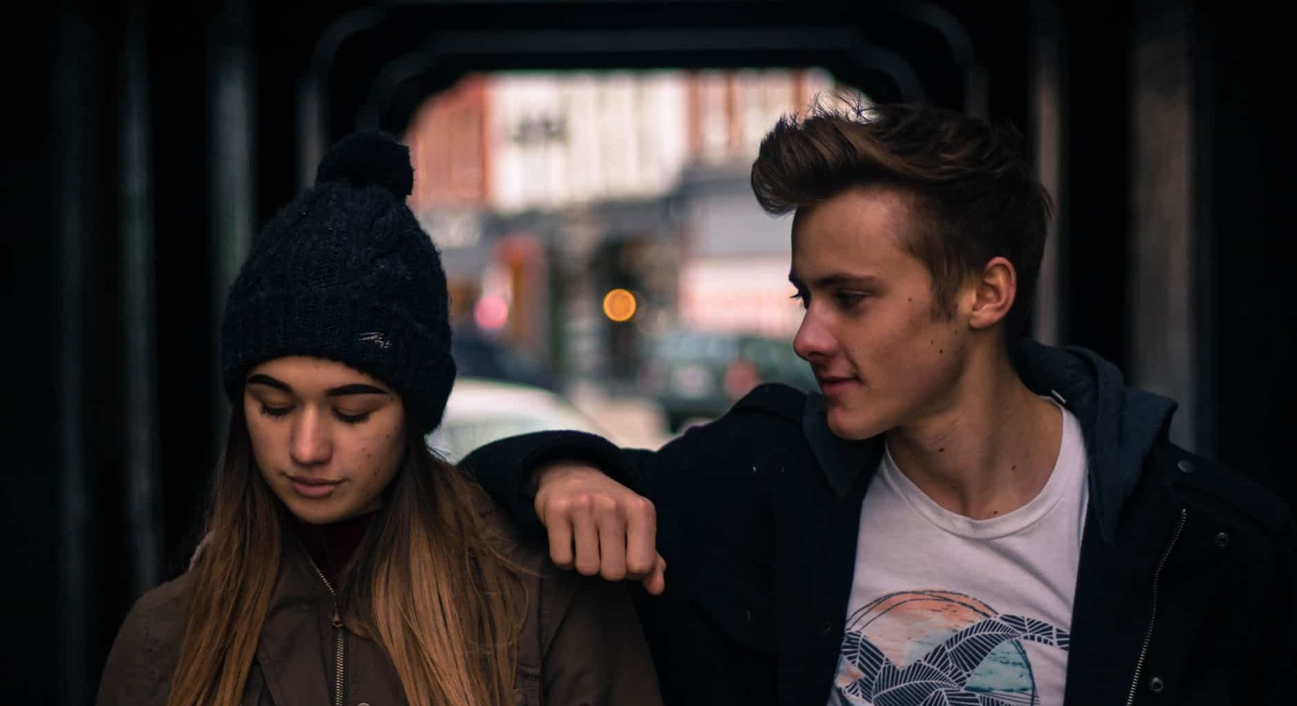 young couple in city at night