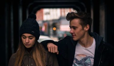 young couple in city at night