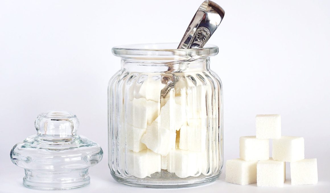 close up photo of sugar cubes in glass jar