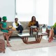 group of women sitting on couch