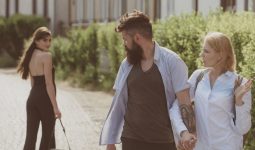 man looking at a woman