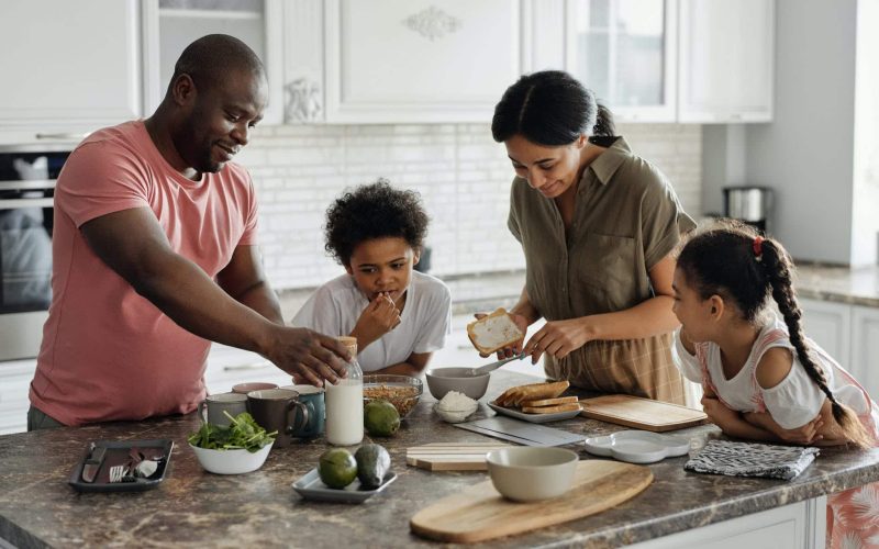 family making breakfast in the kitchen