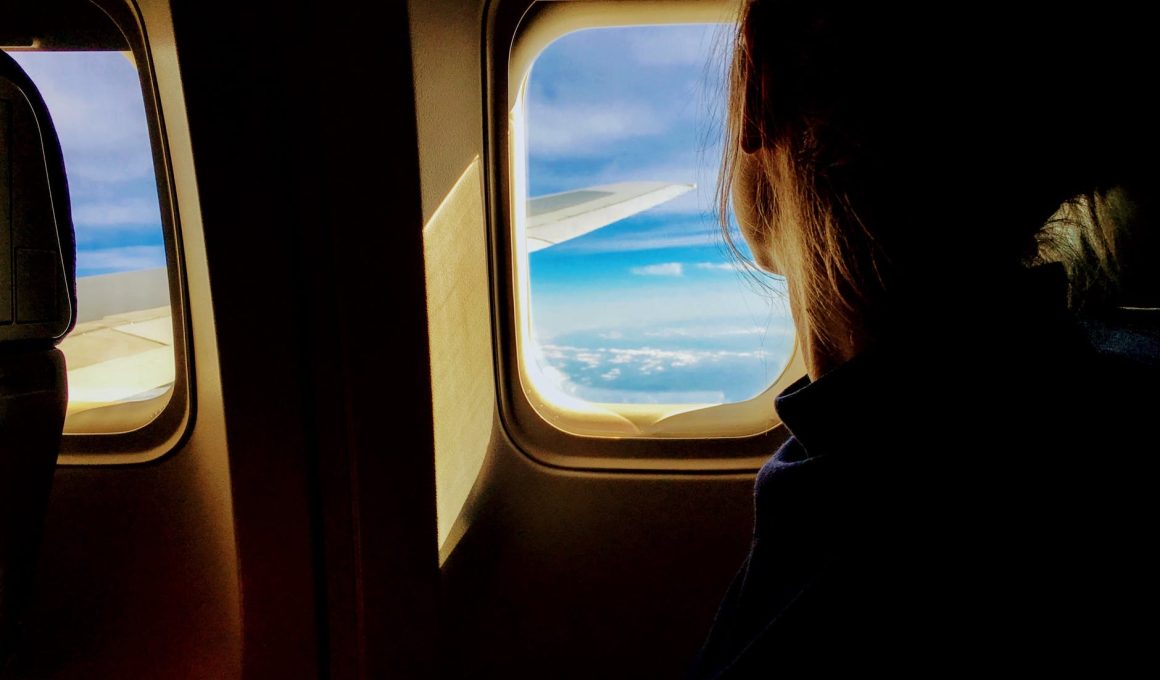 person riding on a plane