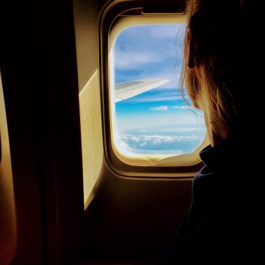 person riding on a plane