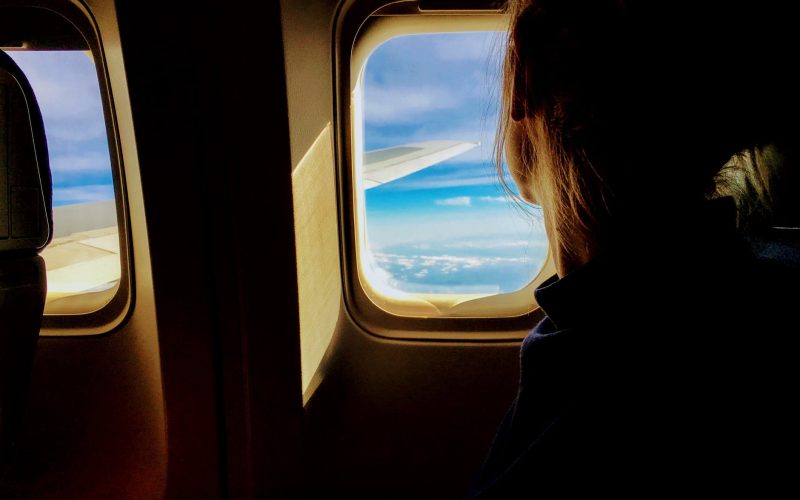 person riding on a plane