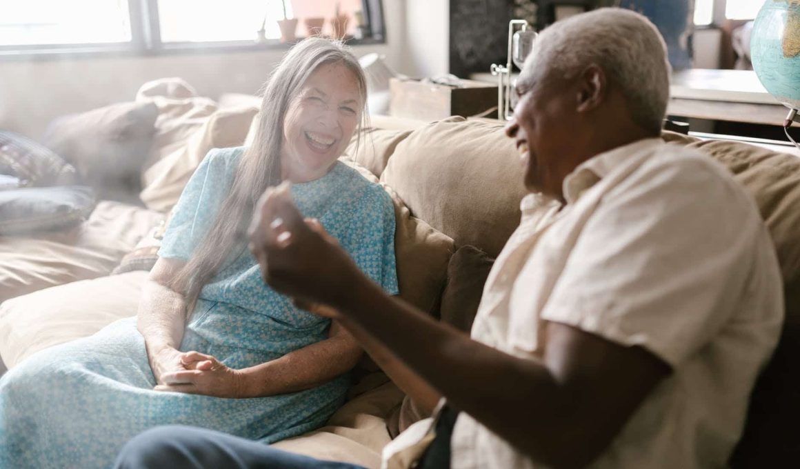 eldelry couple laughing together