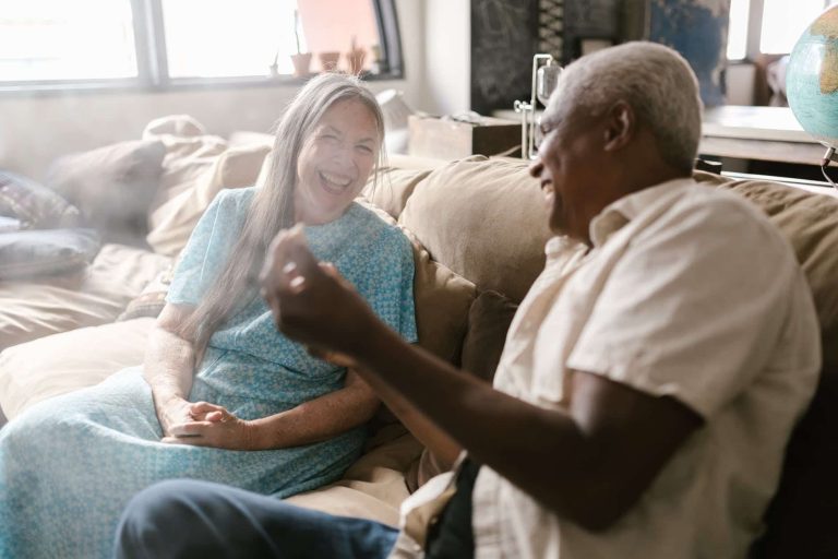 eldelry couple laughing together