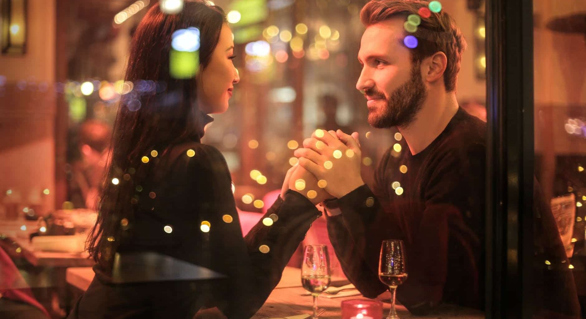 photography of couple holding hands