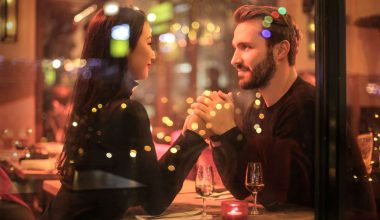photography of couple holding hands