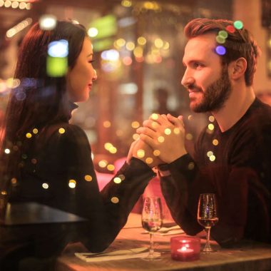 photography of couple holding hands